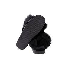 Shepherd Tessan. Is a pair of soft slip-on sheepskin slippers. The slippers have a wide collar made of long-haired sheepskin. The outer sole is made of EVA.